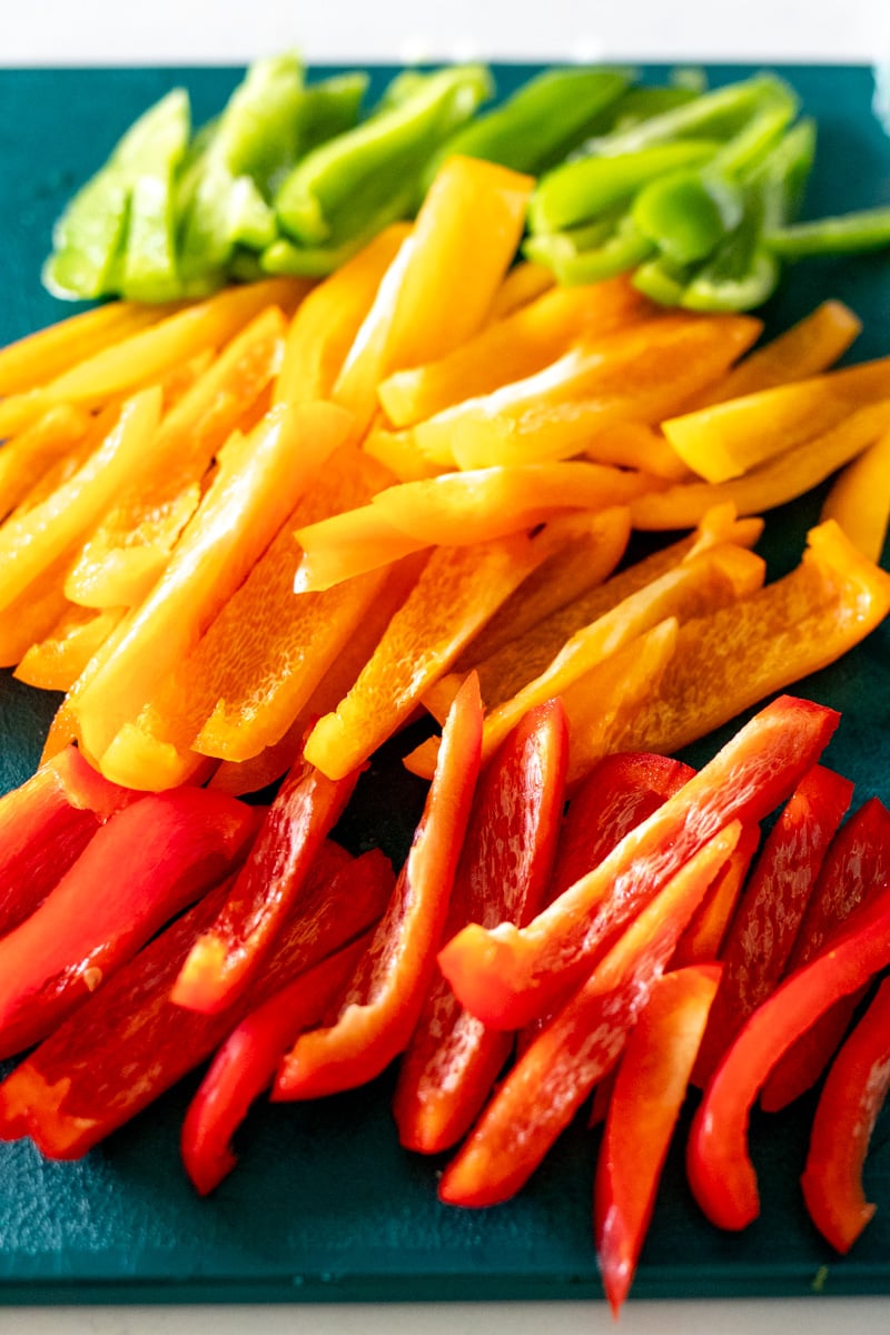 sliced peppers on a cutting board.
