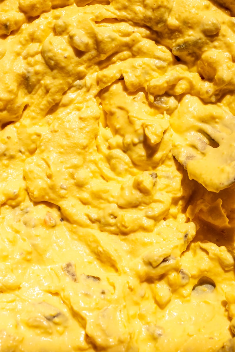 a golden yellow egg yolk mixture with relish, mayo, and mustard. 