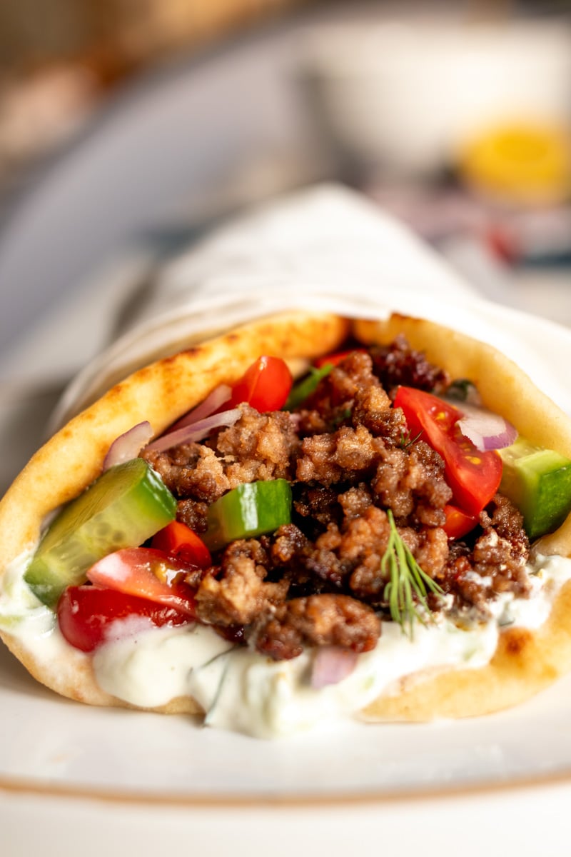 a direct view at a wrapped ground lamb gyro sandwich.