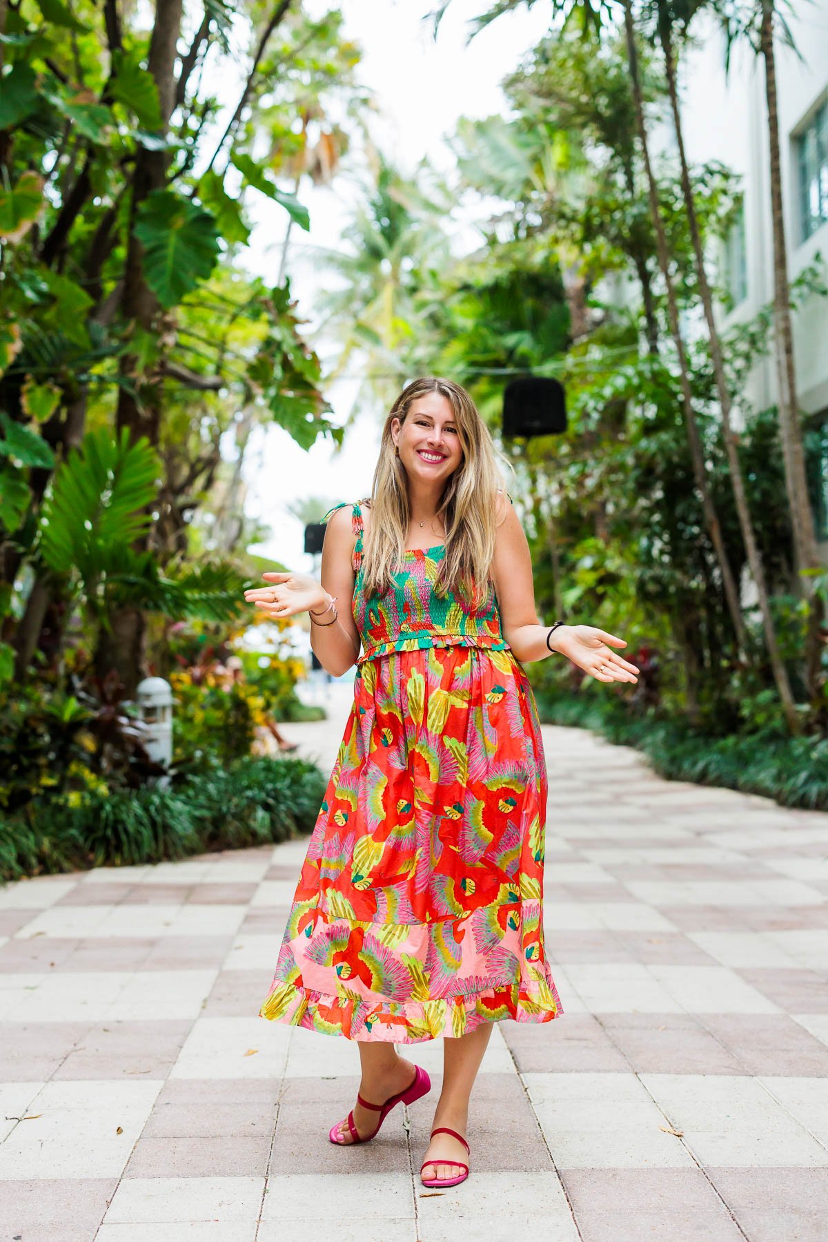 mackenzie smith in a colorful dress with blonde hair.