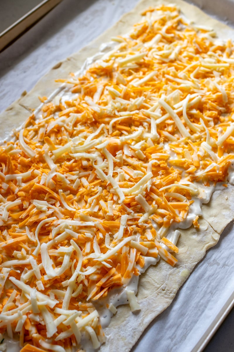 puff pastry topped with shredded cheese. 