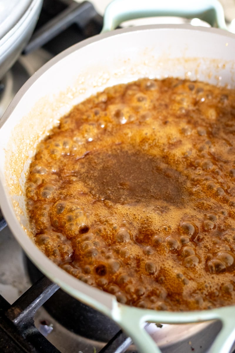 funeral sandwich sauce simmering in a sauce pan.