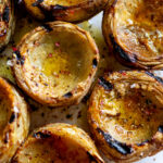 grilled artichoke hearts with sear marks, salt and pepper and lemon juice,