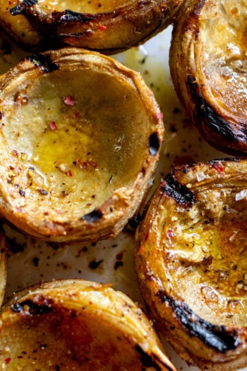 grilled artichoke hearts with sear marks, salt and pepper and lemon juice,