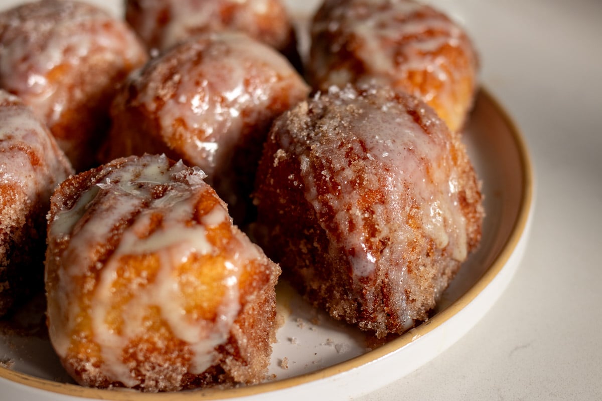 a plate of disney's copycat deep fried hawaiian rolls.