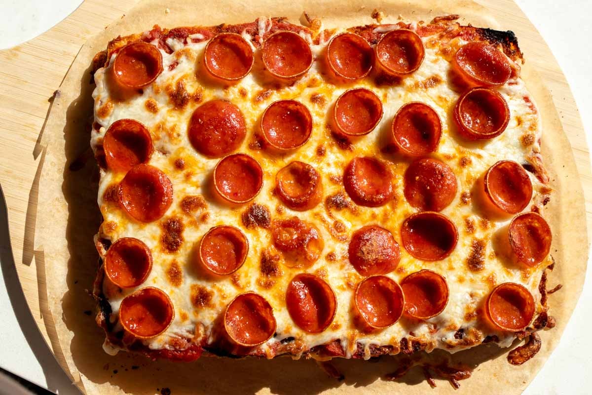 a pack of hawaiian rolls turned into pepperoni pizza.