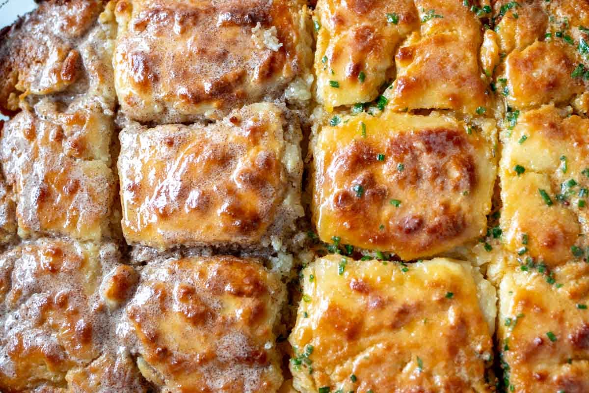 an up close look at both flavors of butter melted on top of butter swim biscuits.