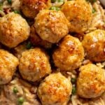 a close up of ground chicken meatballs with a hot honey glaze.