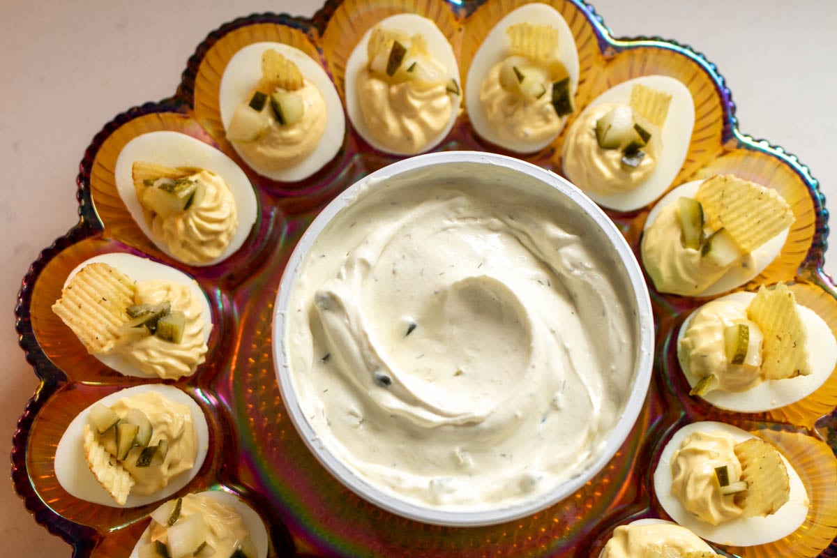 an overhead view of an old fashioned deviled eggs plate full of dill pickle deviled eggs.
