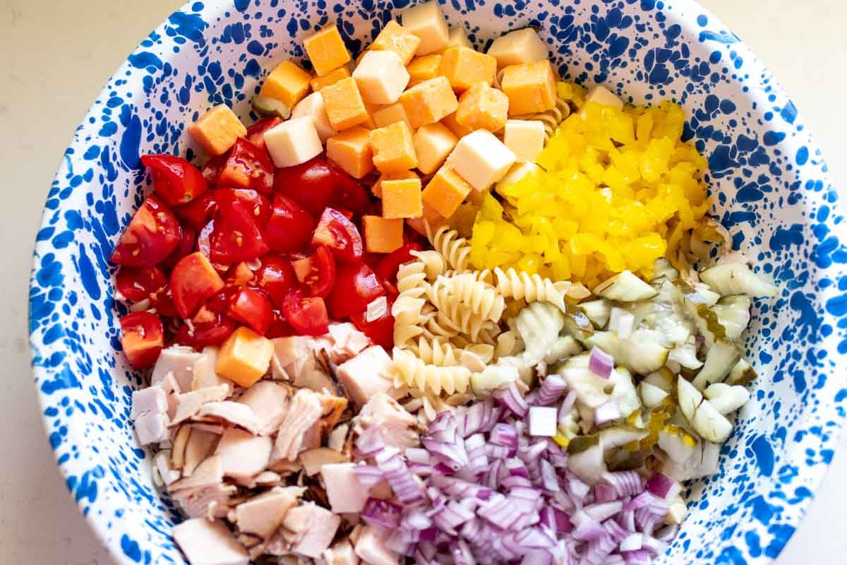 a process picture of the ingredients going into a mixing bowl.