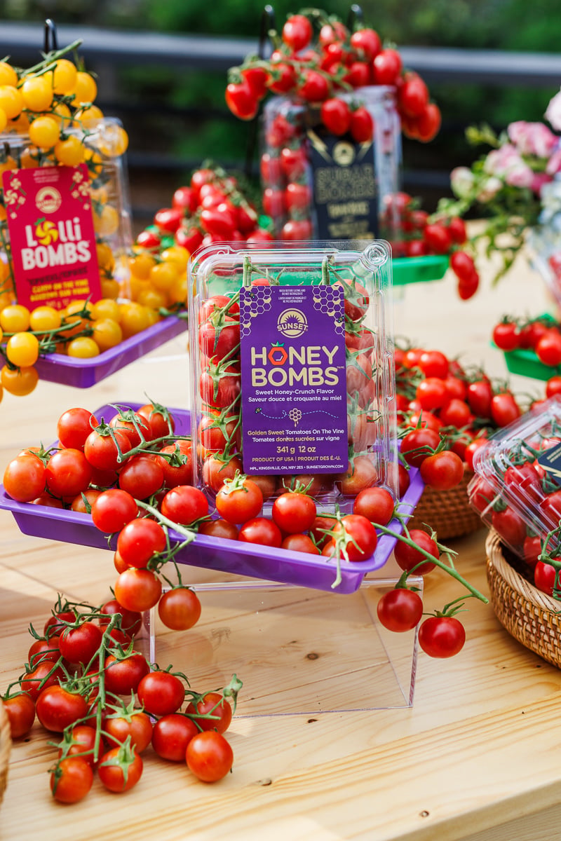 gorgeous bright red cherry tomatoes and their container.